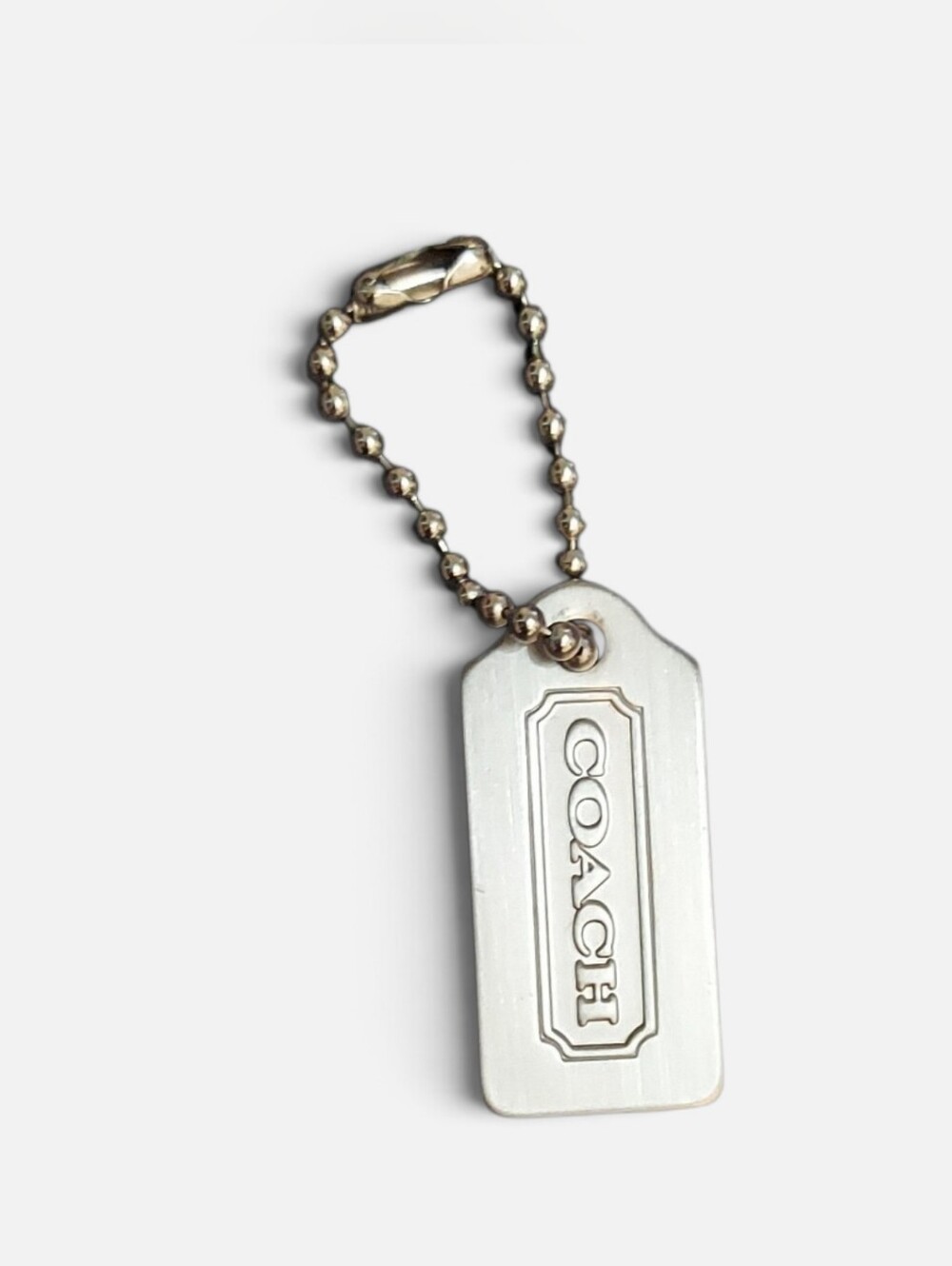 Coach Hangtag Small Brushed Chrome Metal Measures 1.25" X .5" Aprox. Great Cond